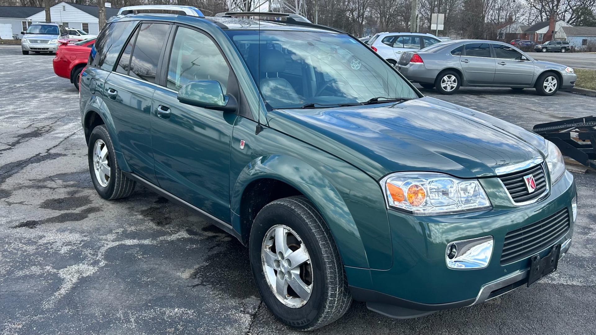 2007 GREEN /GREY Saturn Vue (5GZCZ53427S) , located at 2710A Westlane Rd., Indianapolis, IN, 46268, (317) 291-2000, 39.885670, -86.208160 - Photo#1